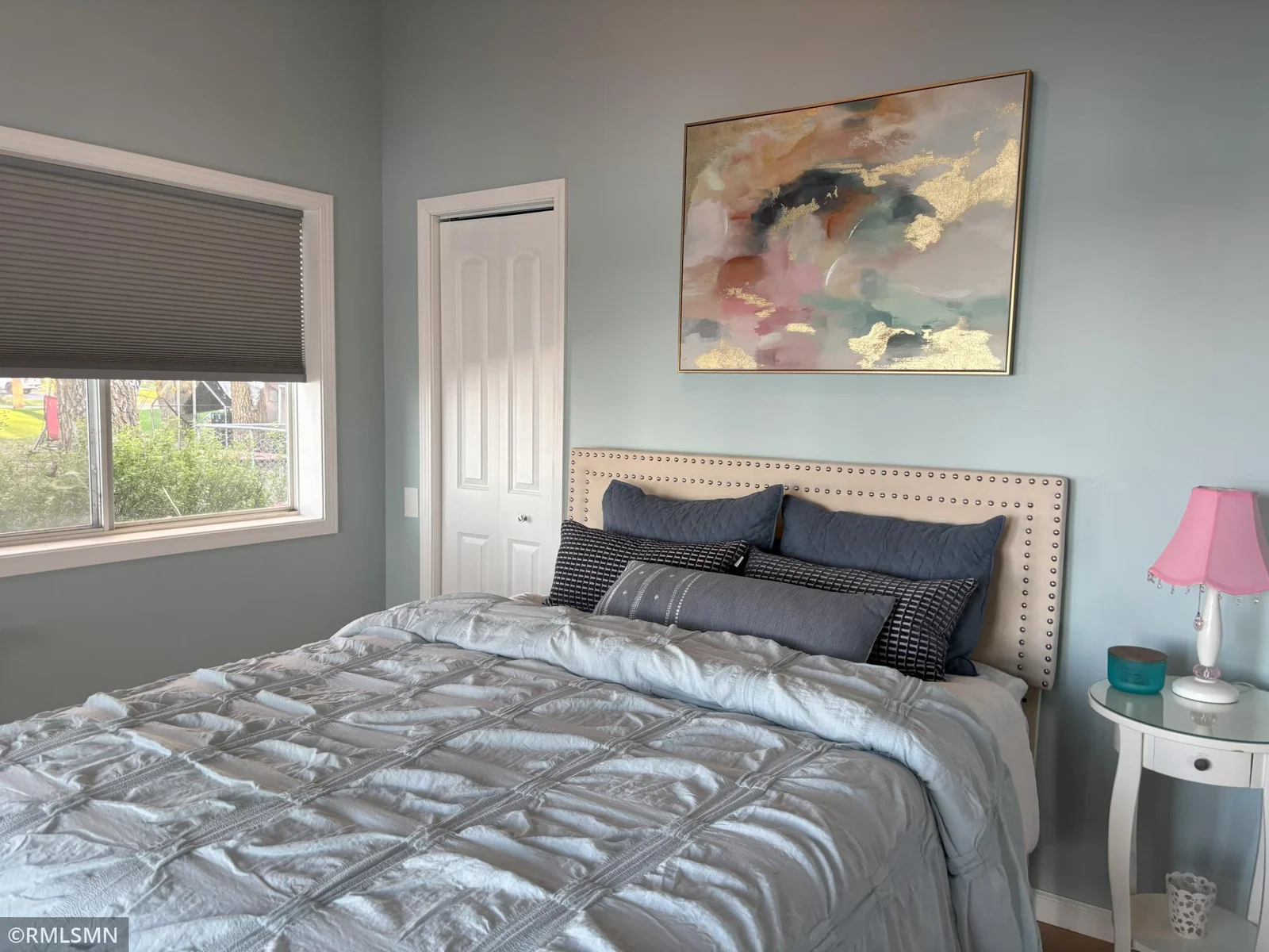 Bedroom with lakeside views