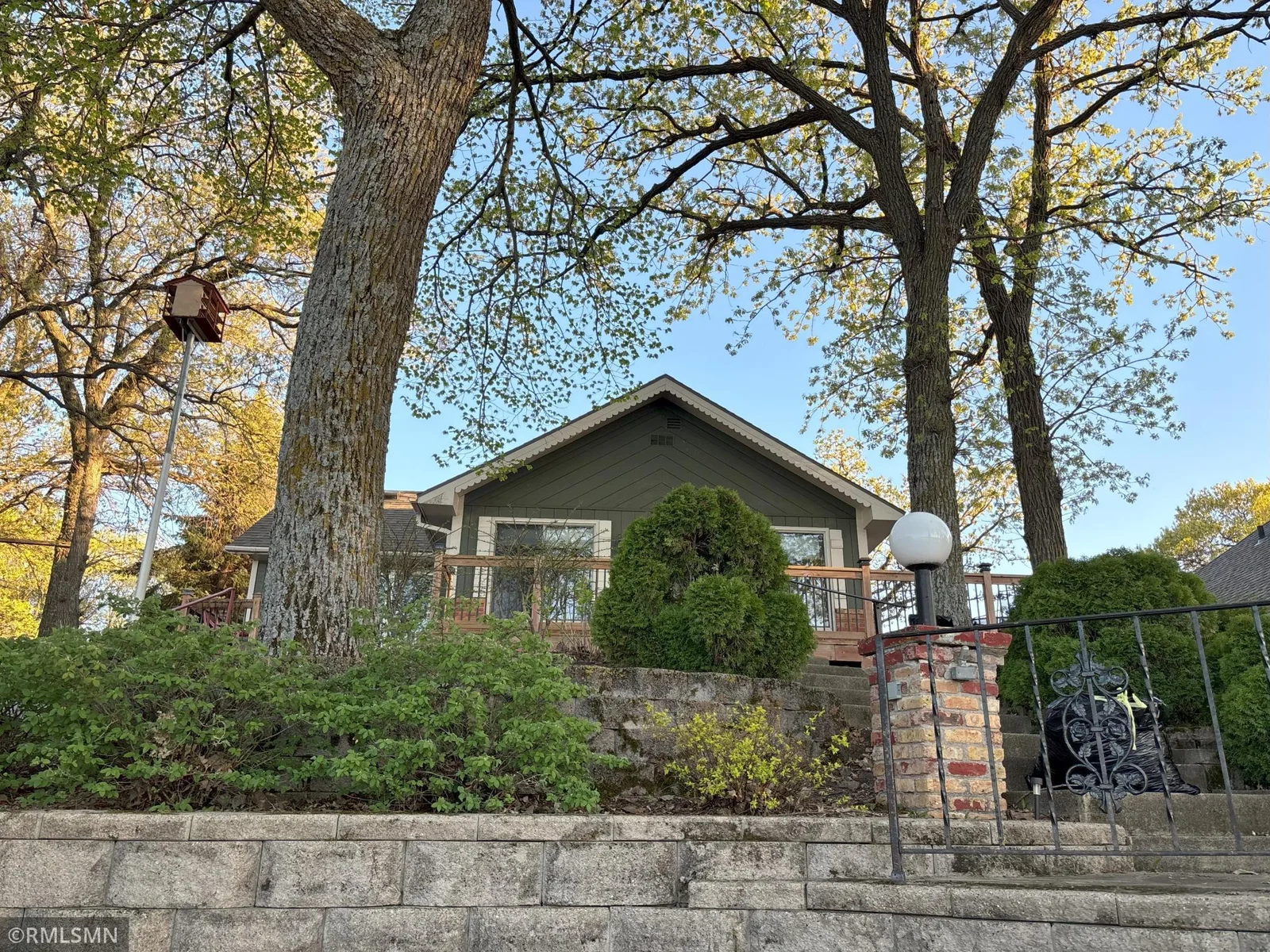 Landscaped with perennials and retaining wall