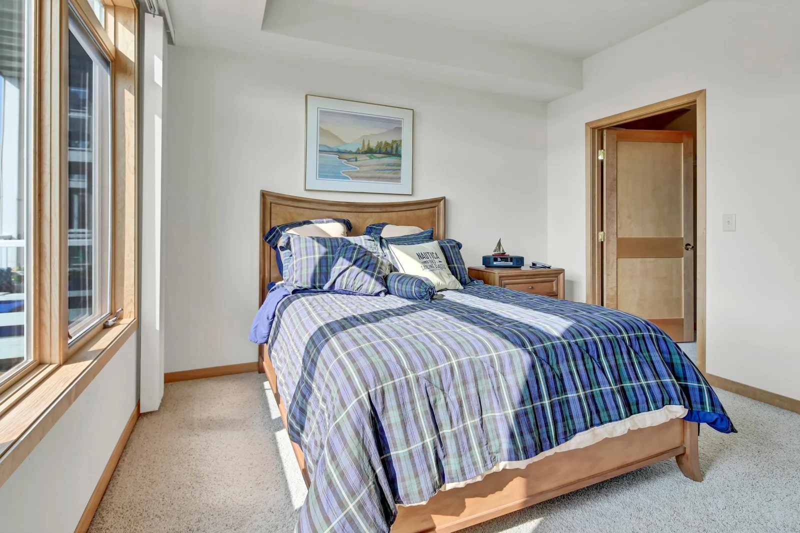 Primary bedroom with balcony access