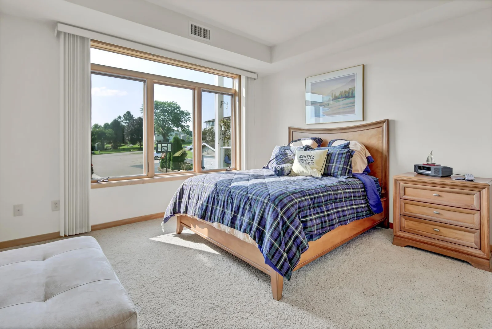 Primary bedroom with balcony access