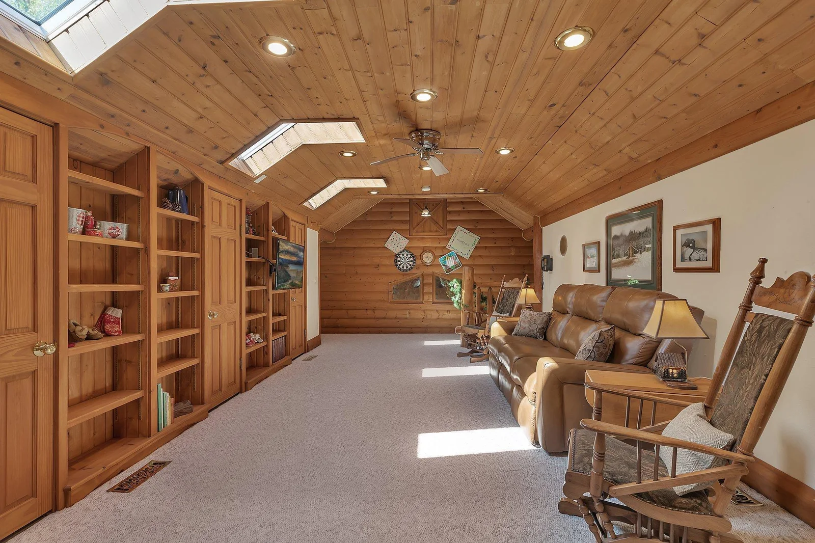 Sunshine brightens and envelops the Upper Level Family Room.