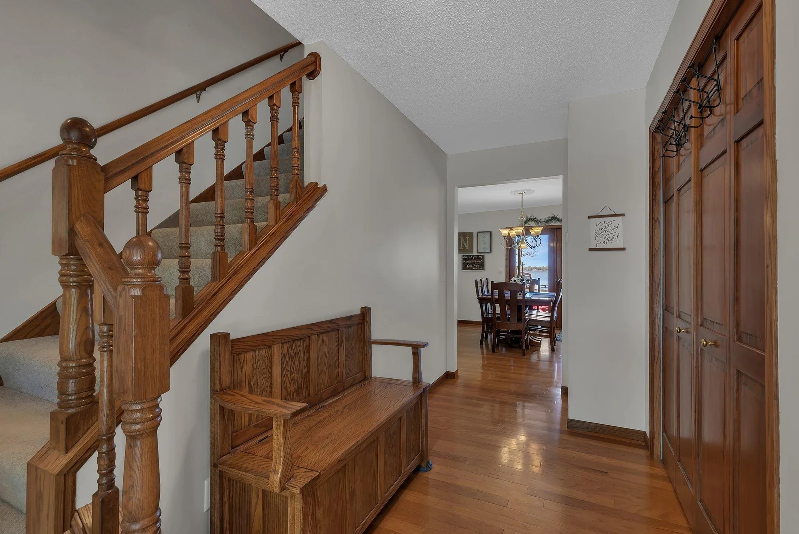 Hardwood floors in the foyer, dining room, and kitchen