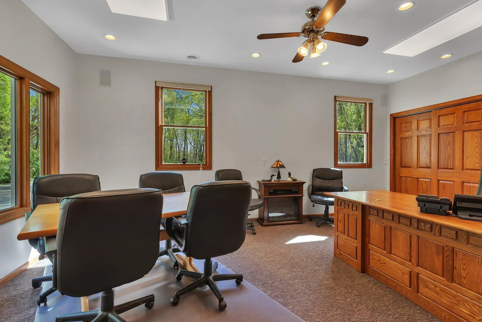 Primary Office. Desk is not built in. Could be a main floor bedroom, exercise room, or billiard room. Many possibilities.
