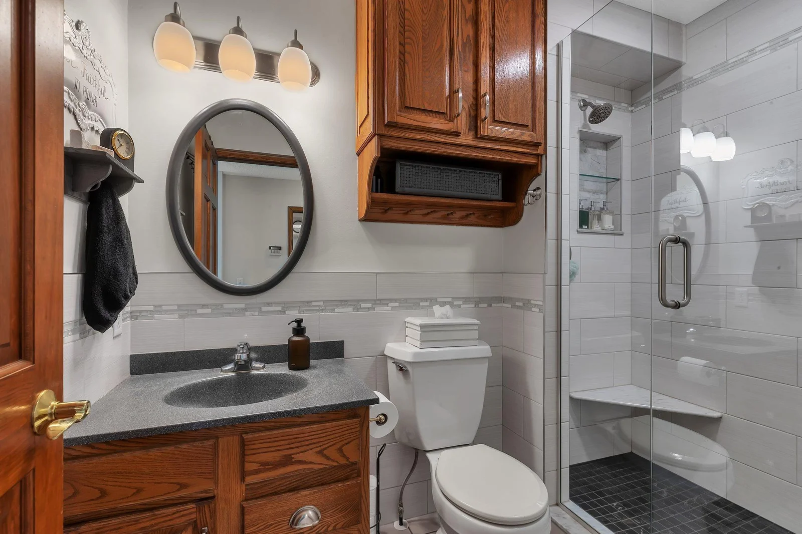 Newly remodeled main floor 3/4 bath. New tile and walls, and shower: surround & floor.