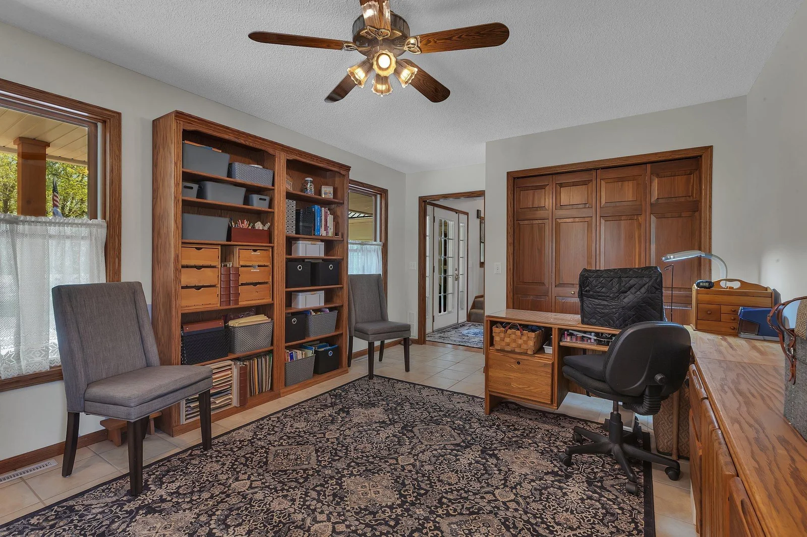 Flex room off of Foyer. Currently used as a sewing room.  Could be a Main floor bedroom.