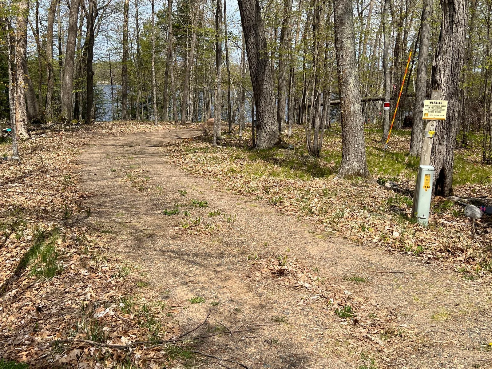 THE DRIVEWAY AS IT ENTERS THE PROPERTY.