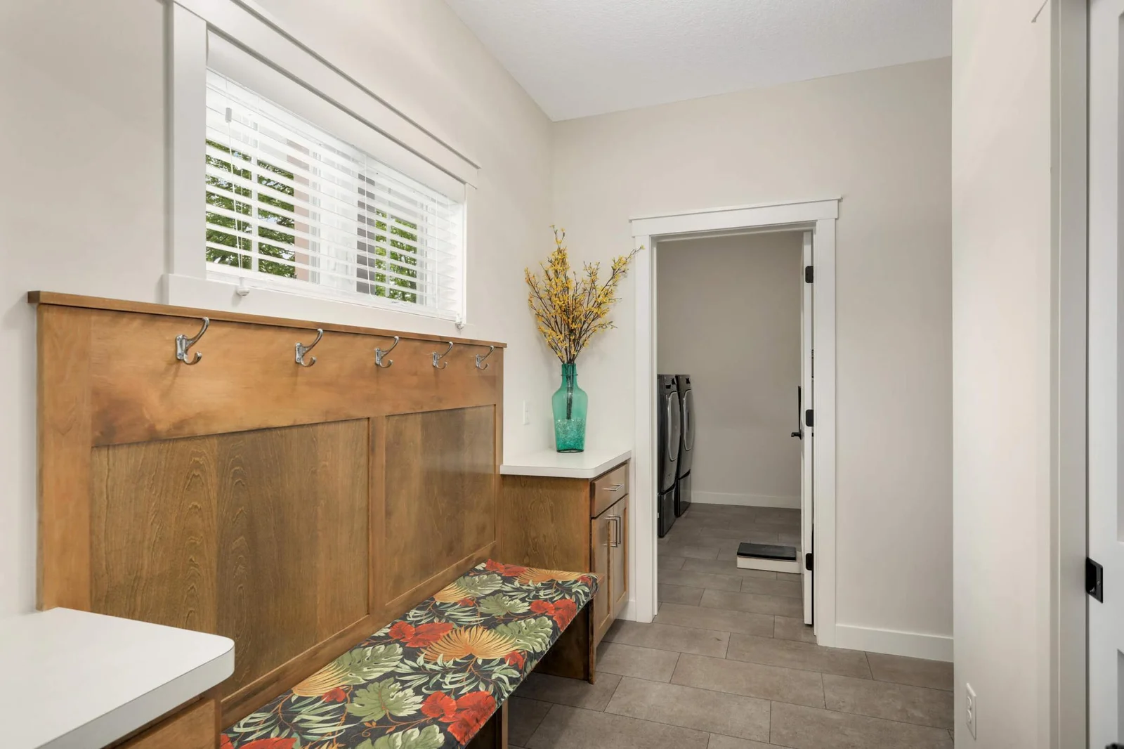 Mainfloor Laundry & Mudroom just off the 1,200 Sq. Ft. garage