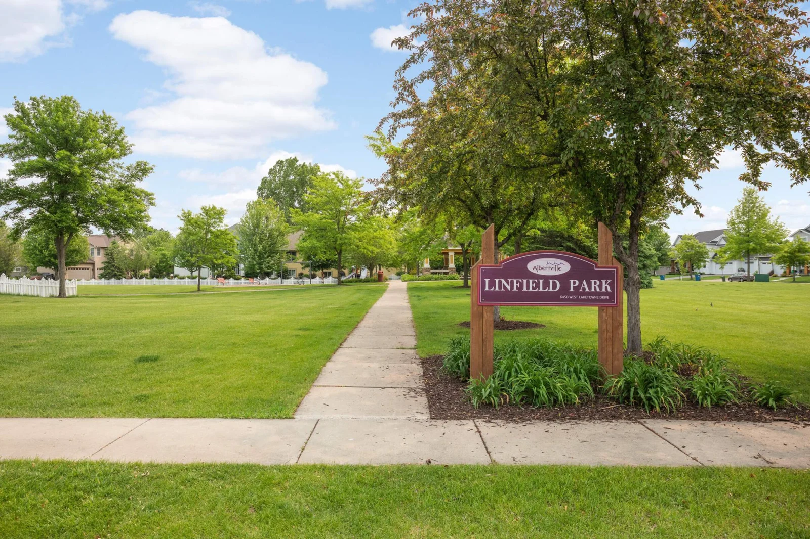 ...your new address looks directly across the street at quiet Linfield Park