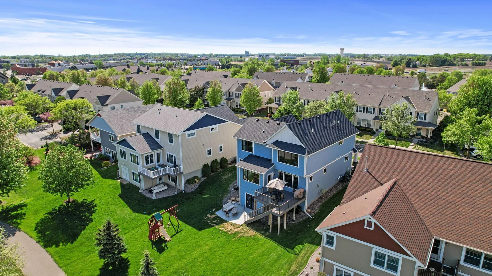 Three access points to the backyard -- garage service door, LL patio walk-out, kitchen deck door.
