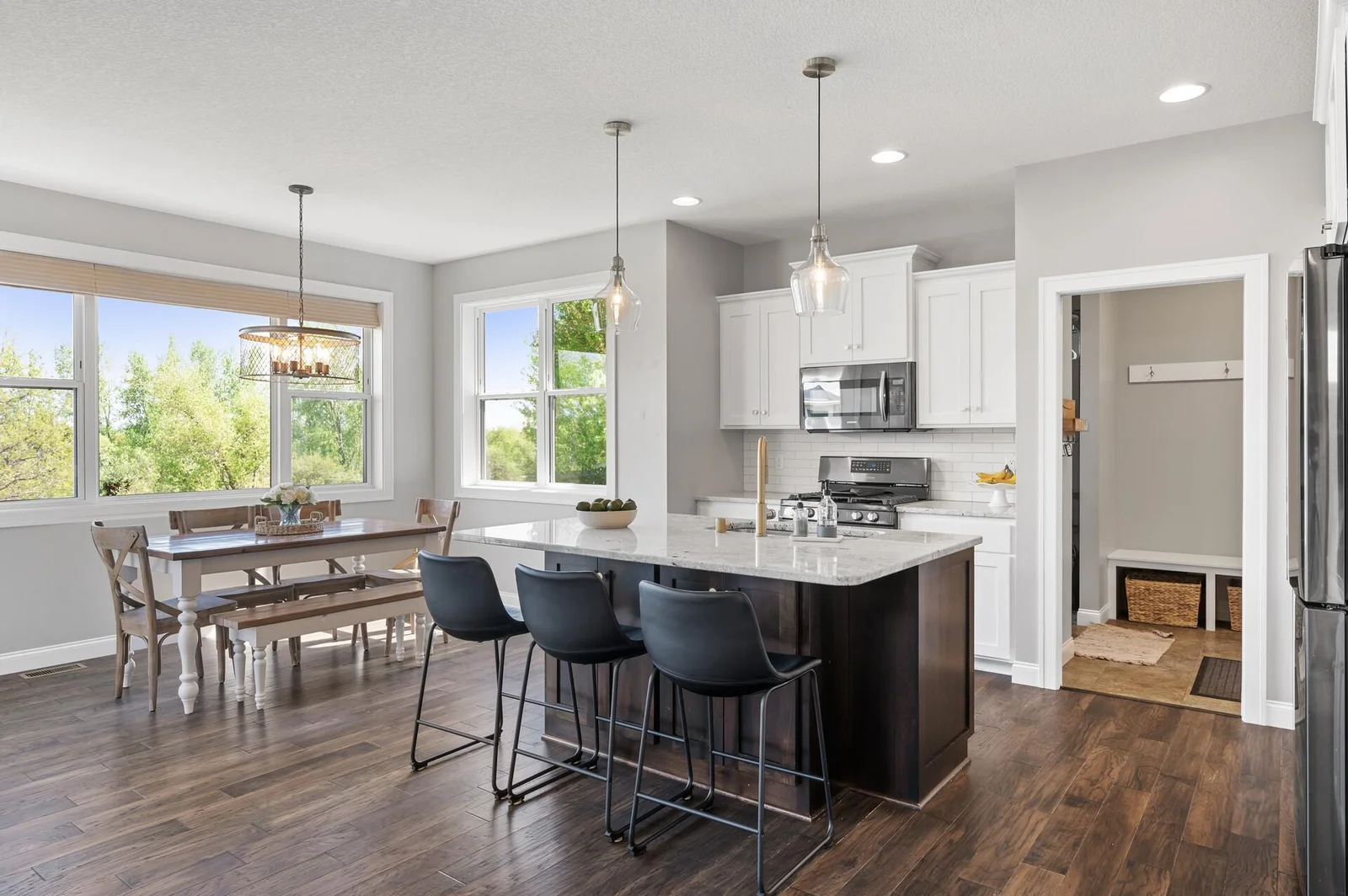 Natural light + updated pendant lighting = a well lit space