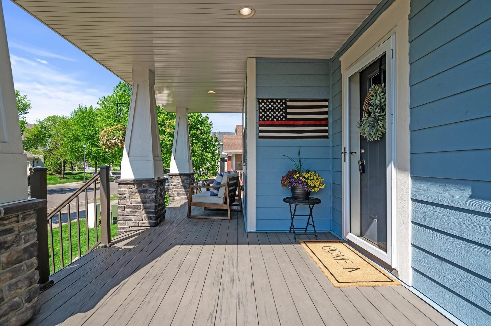 Welcoming covered front porch - maintenance free