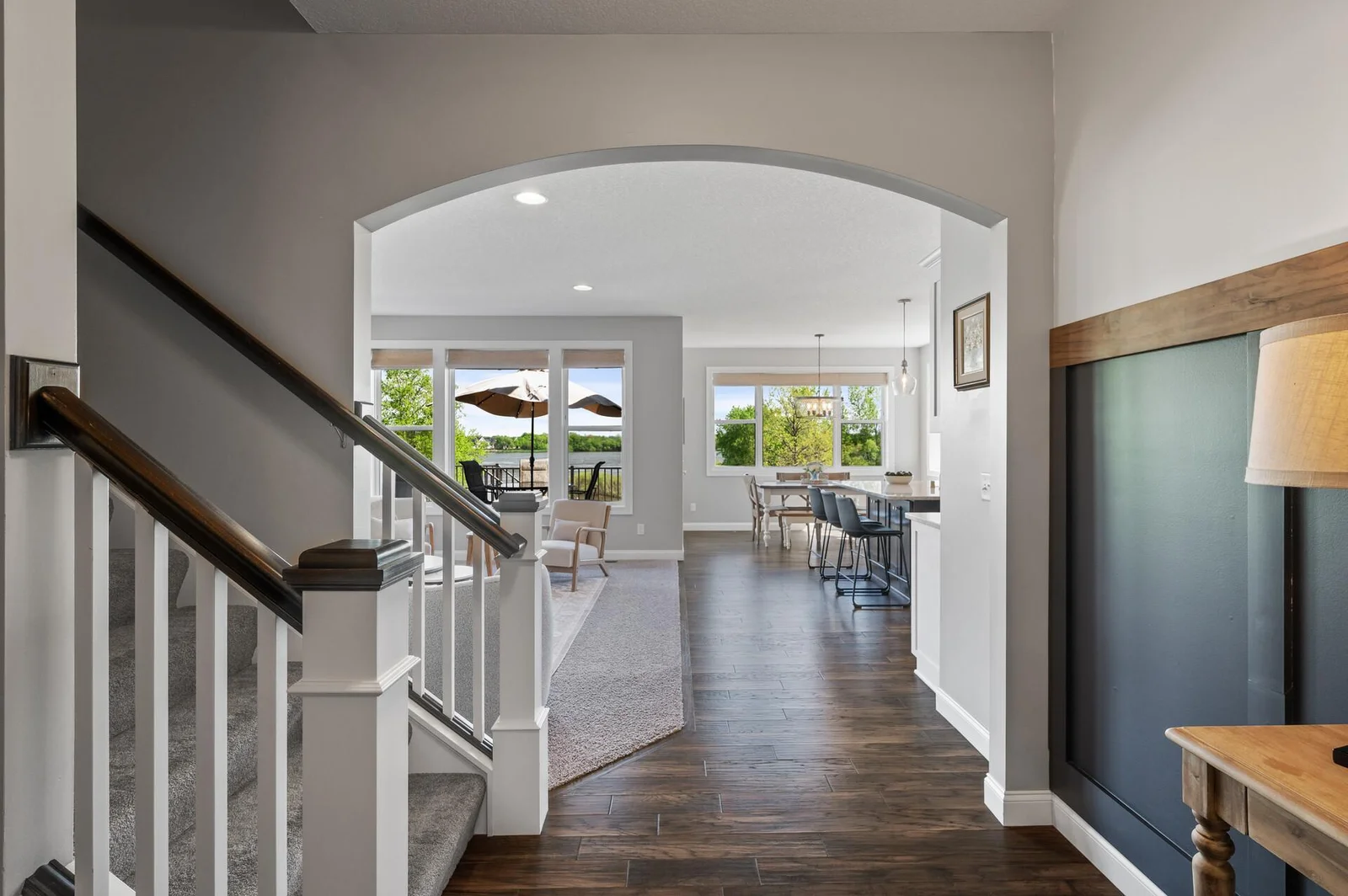 Arched doorway separating the entry area to the living space.