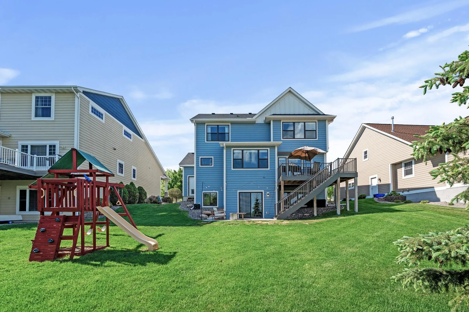 The back of the home offers so many amenitites.