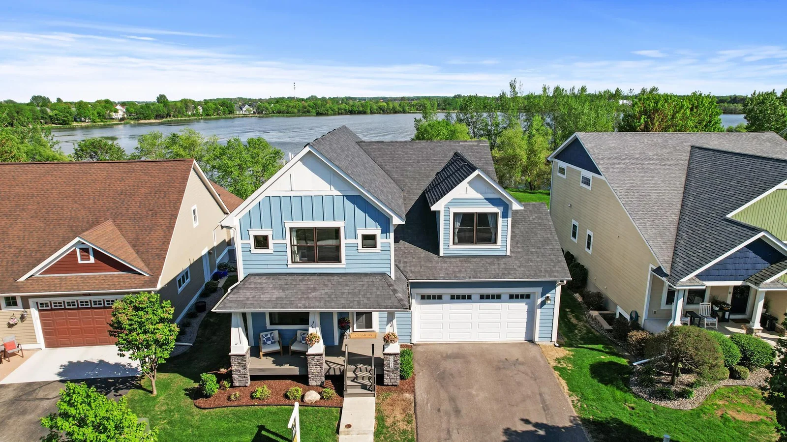 Front covered deck adds extended living outdoor space.