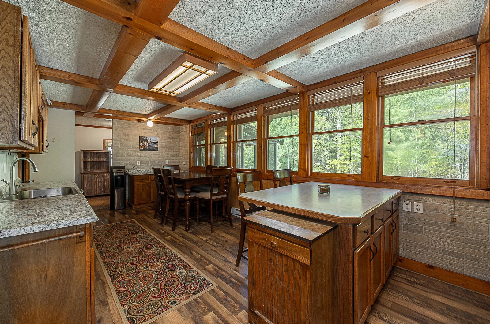 Large bank of windows brings the outdoors in.