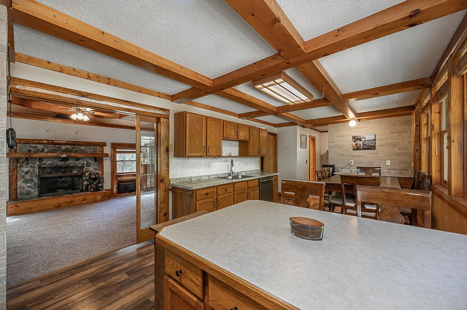 Additional views from Kitchen into living room.