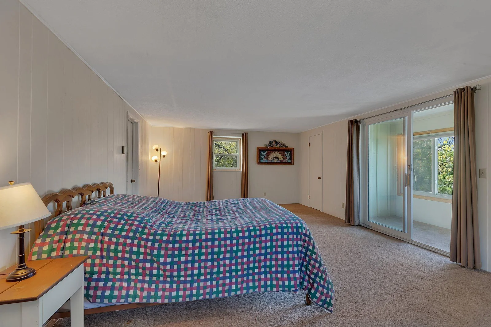 Master bedroom on 2nd level overlooking lake