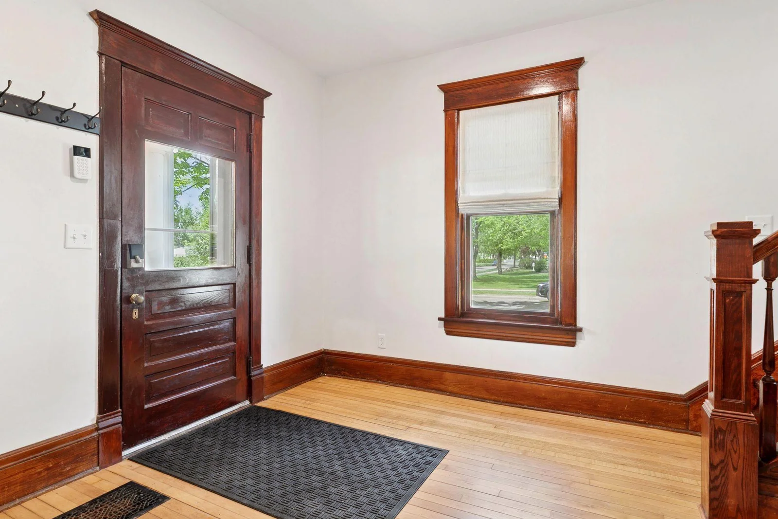 An expansive foyer greets you as you step in from the front porch. The original turn of the century character intact.