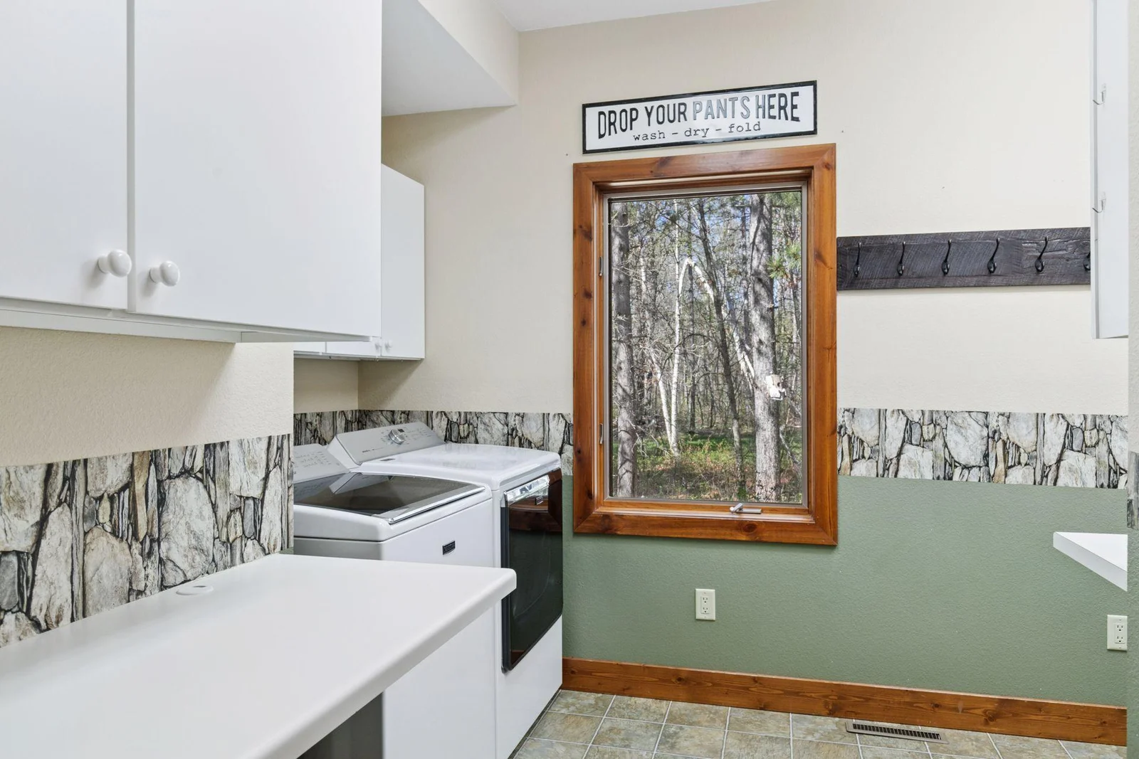 Main floor laundry adjacent to primary. Take the virtual tour to truly appreciate the size of this room.
