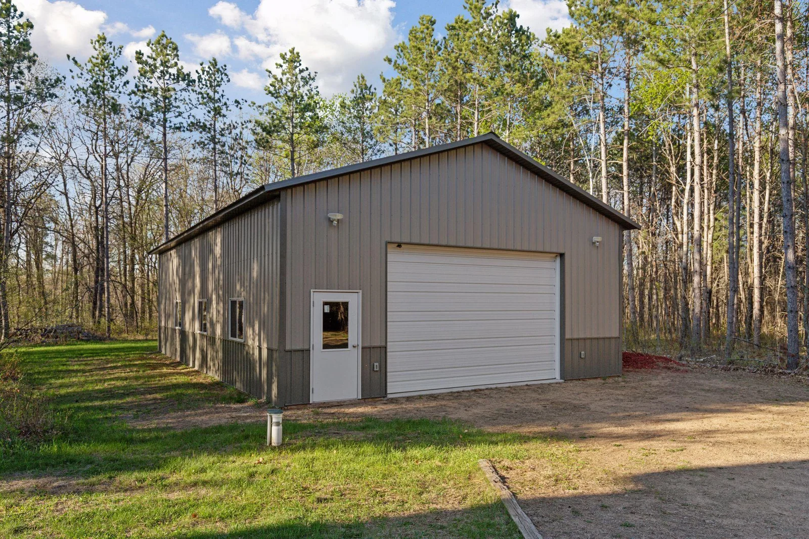 Oversized heated, 2+ car attached garage, PLUS pole barn built in 2020.