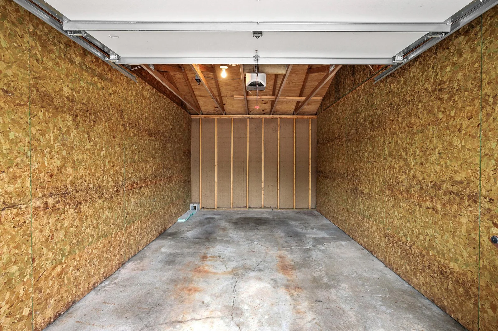 Garage space. This unit also includes one assigned parking spot.