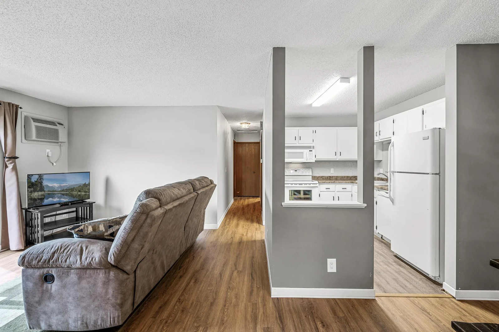 Kitchen, living room and hall views