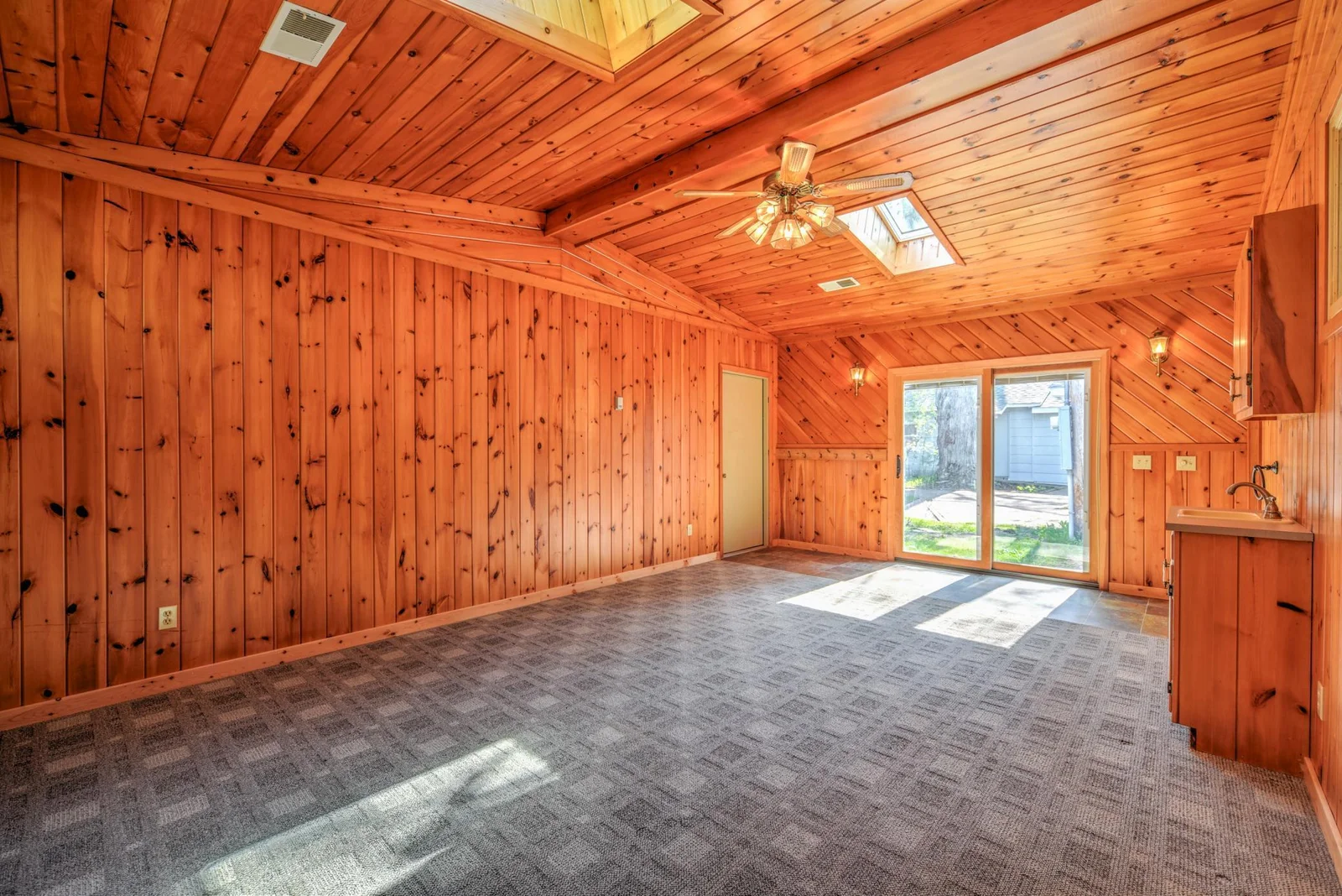 Featuring separate entrance and access to heated garage