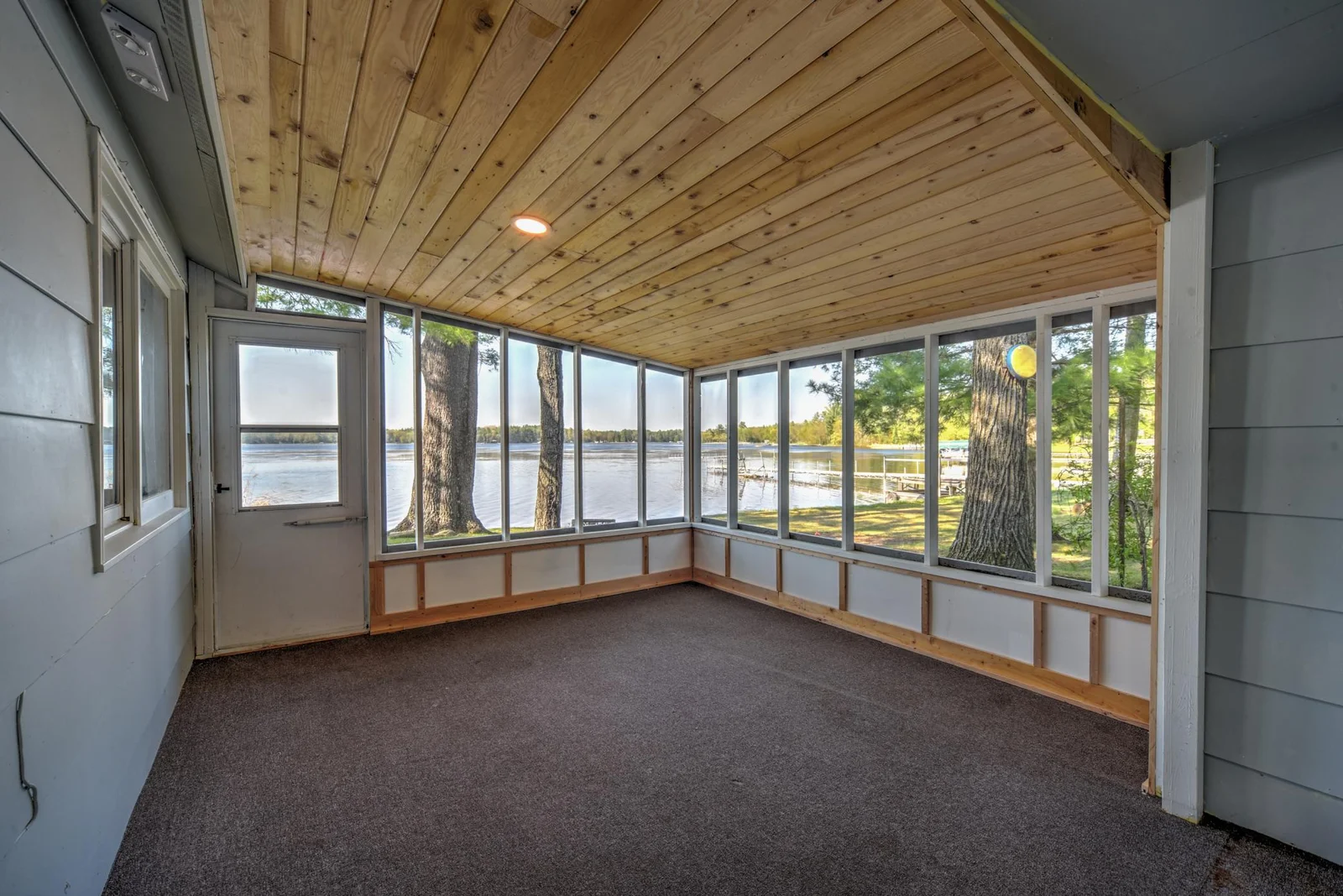 New T&G knotty pine ceiling, new screen door, new screens and trim.