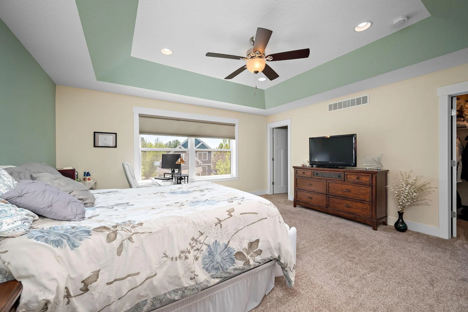 Primary bedroom with 2 walk in closets