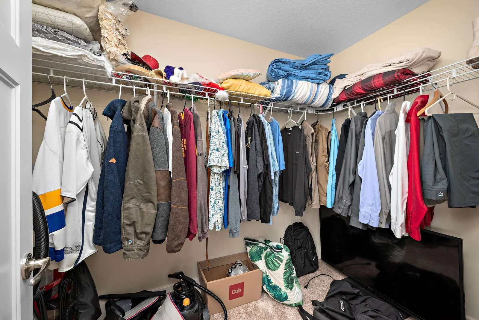 Primary bedroom with 2 walk in closets
