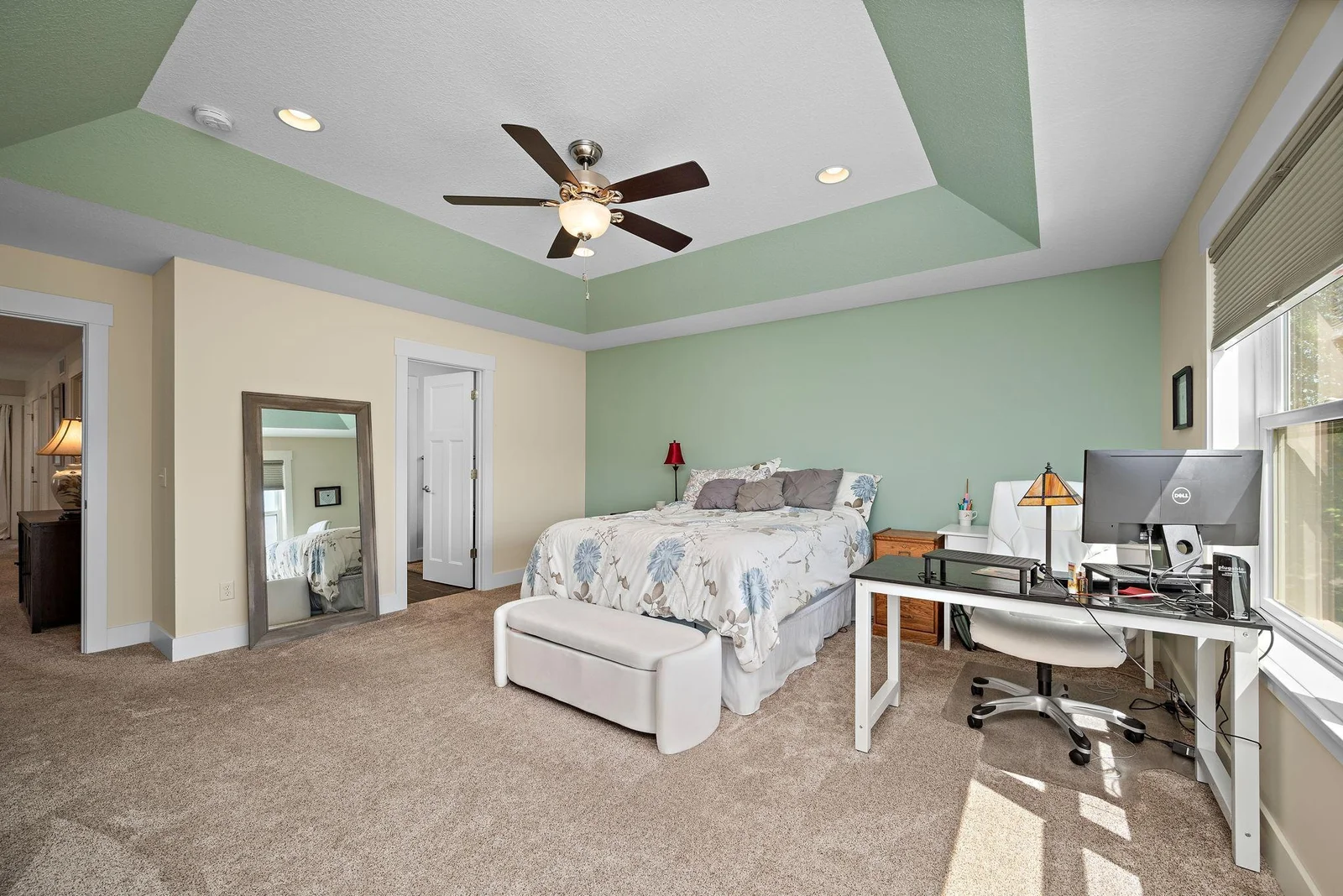 Primary bedroom with tray ceiling