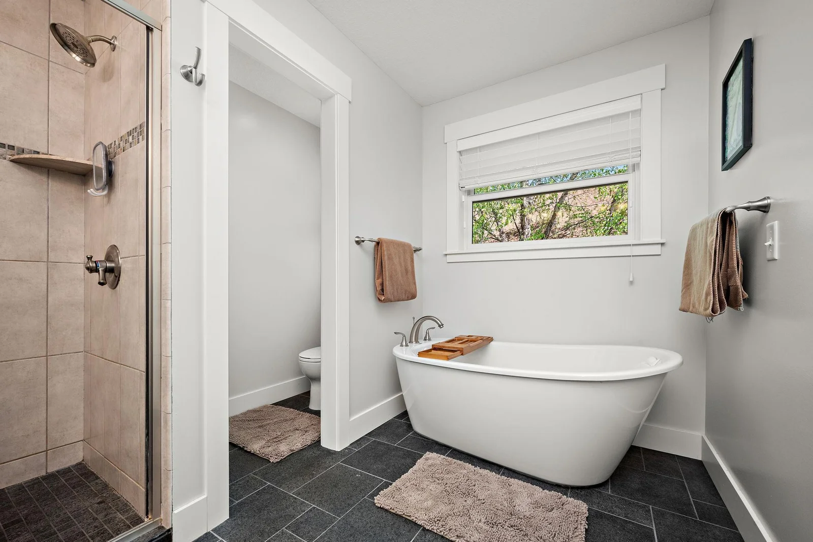 Full primary bath with separate shower and tub