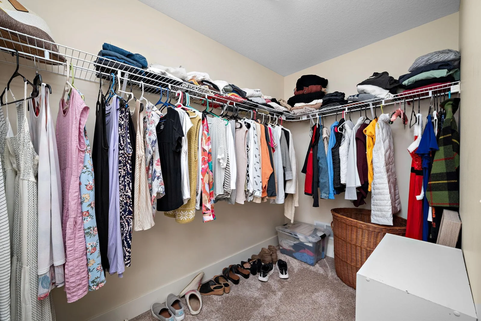 Primary bedroom with 2 walk in closets