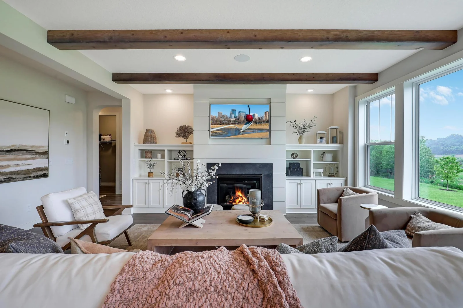Custom built-in with shiplap fireplace surround