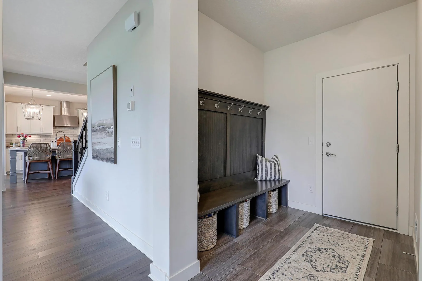Mudroom with  built ins, as well as a huge walk in closet.