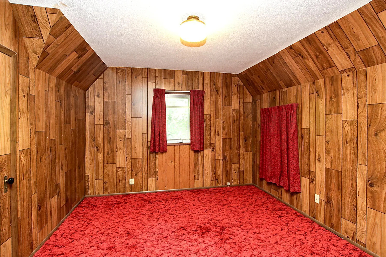 Second bedroom on the upper floor - take a peek in the closet to see the original hard-wood floors!