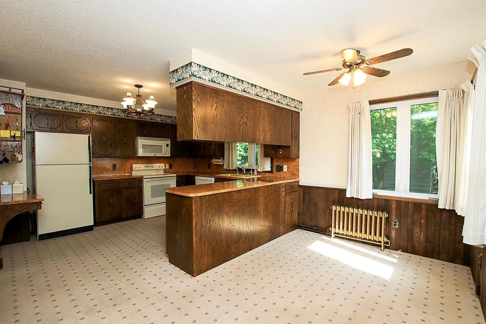 Large kitchen and eat-in informal dining room