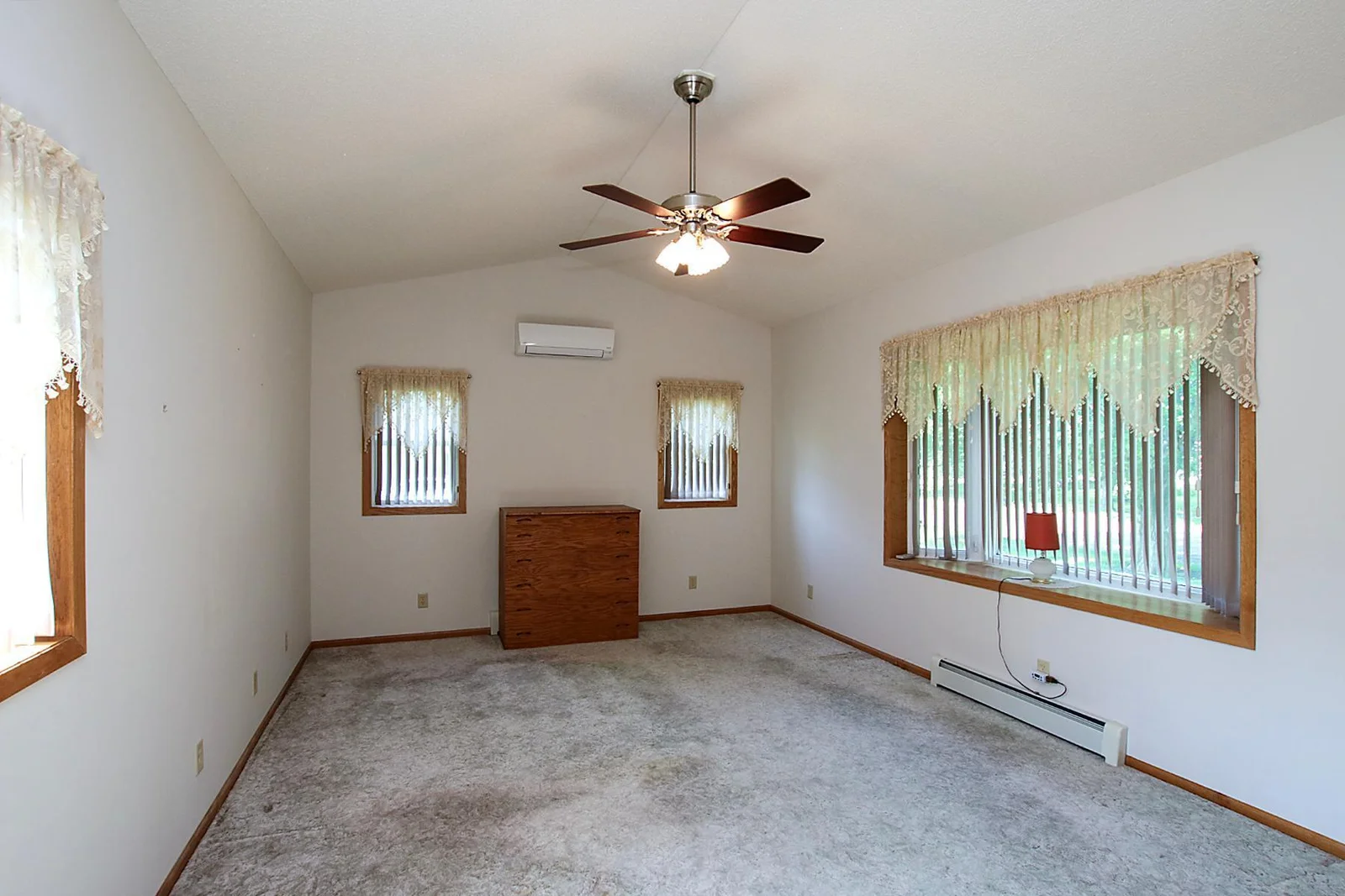 Main floor bedroom, boasting lots of natural light, and ductless mini-split!