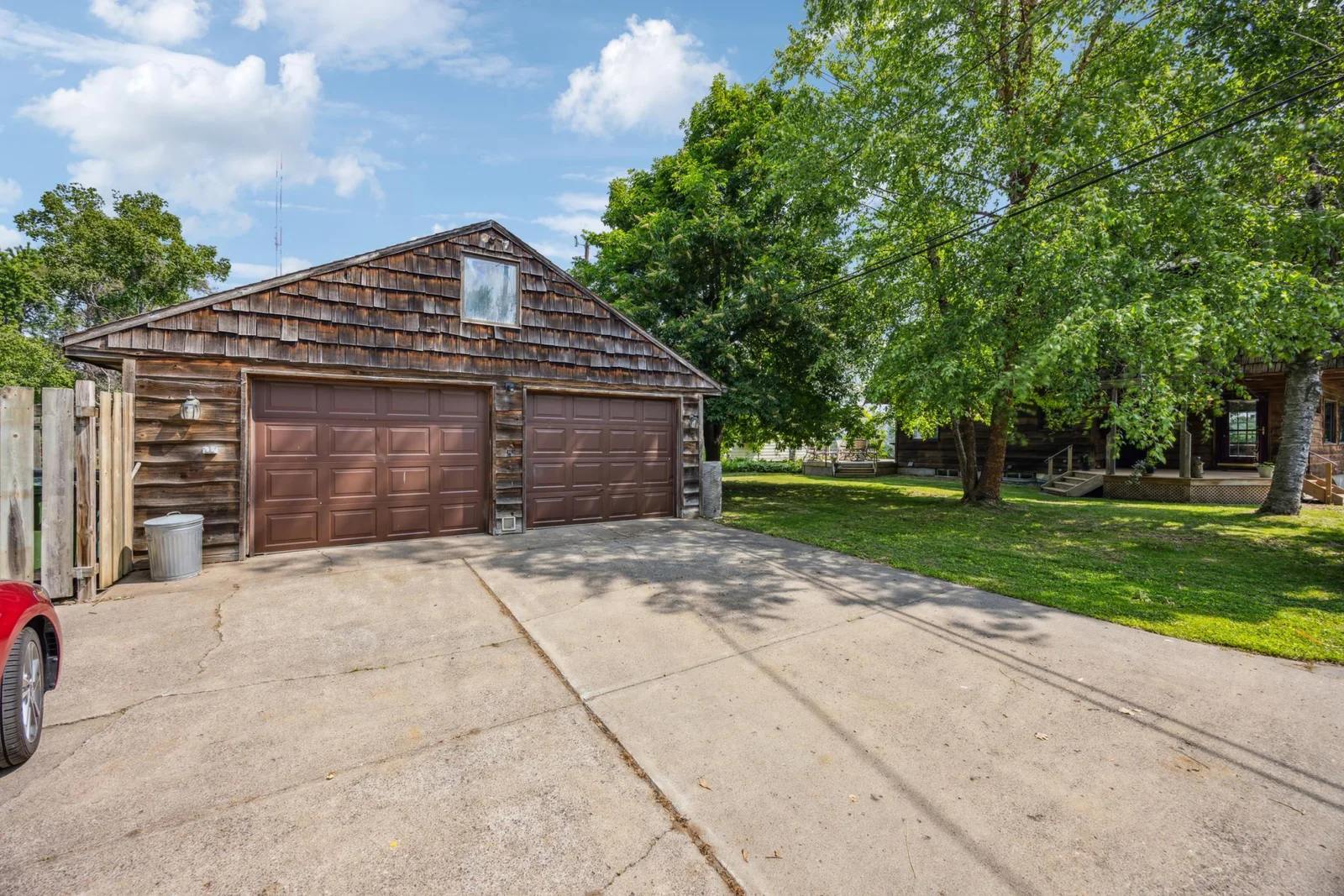 Oversized two car detached garage.  Concrete Driveway.