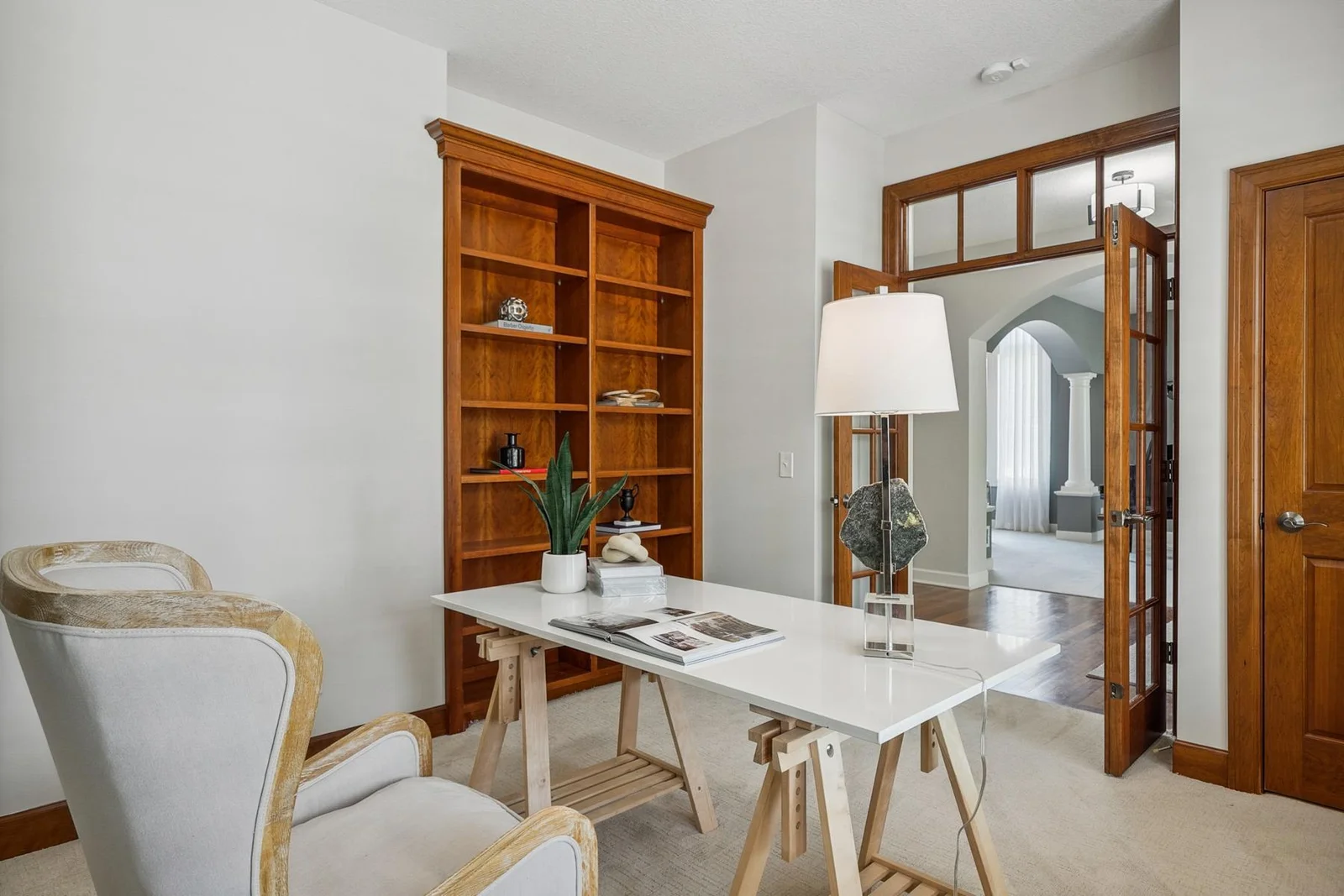 Rich cherry cabinetry adds warmth and function to this elegant main-level office.