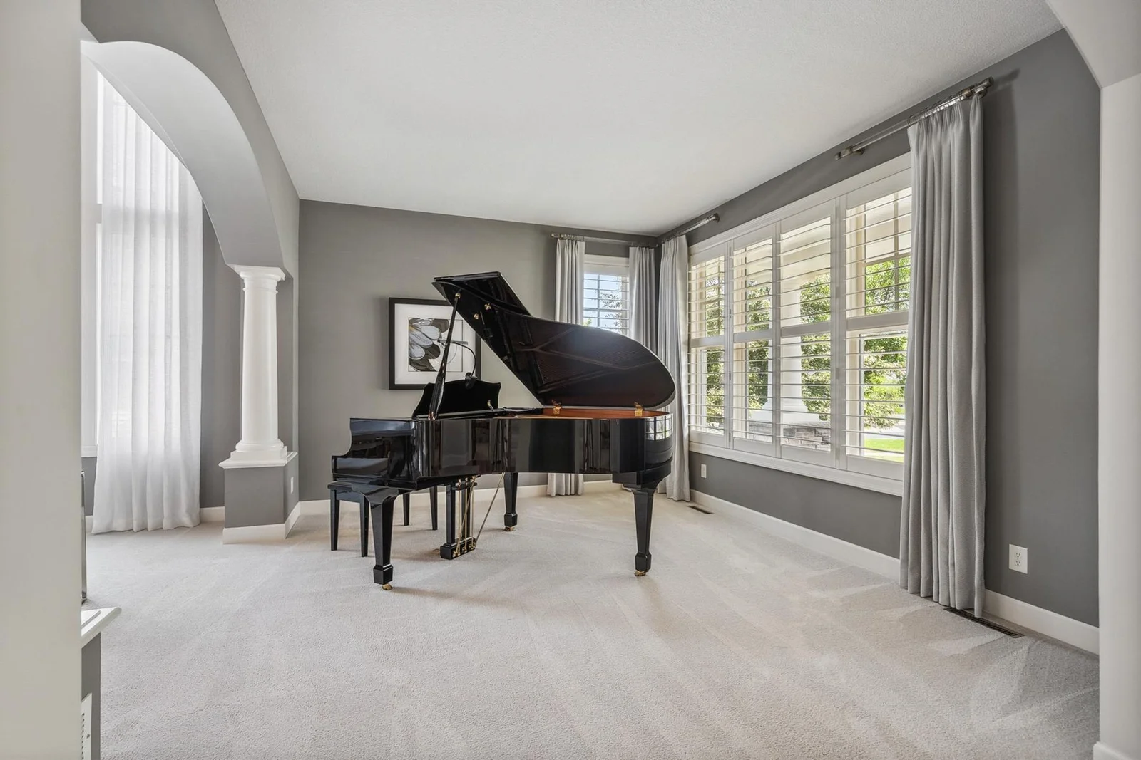Elegant piano room or sitting area—an inspiring space to relax or entertain.