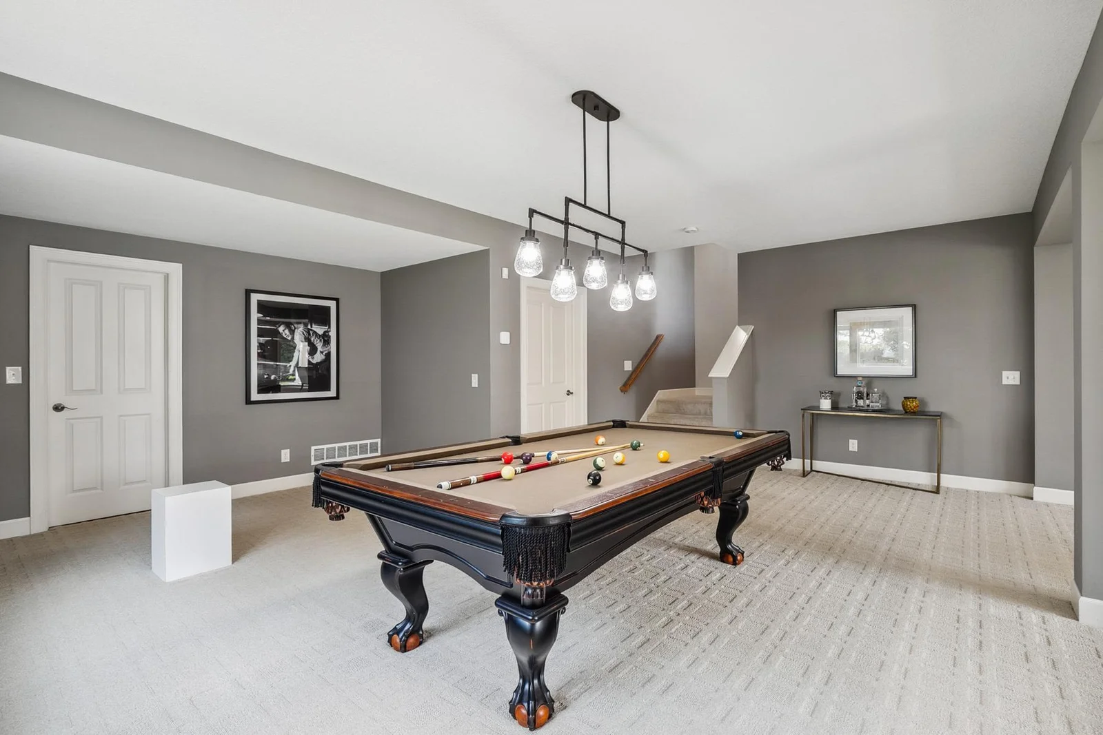Entertain in style with a pool table area perfect for game nights and gatherings.