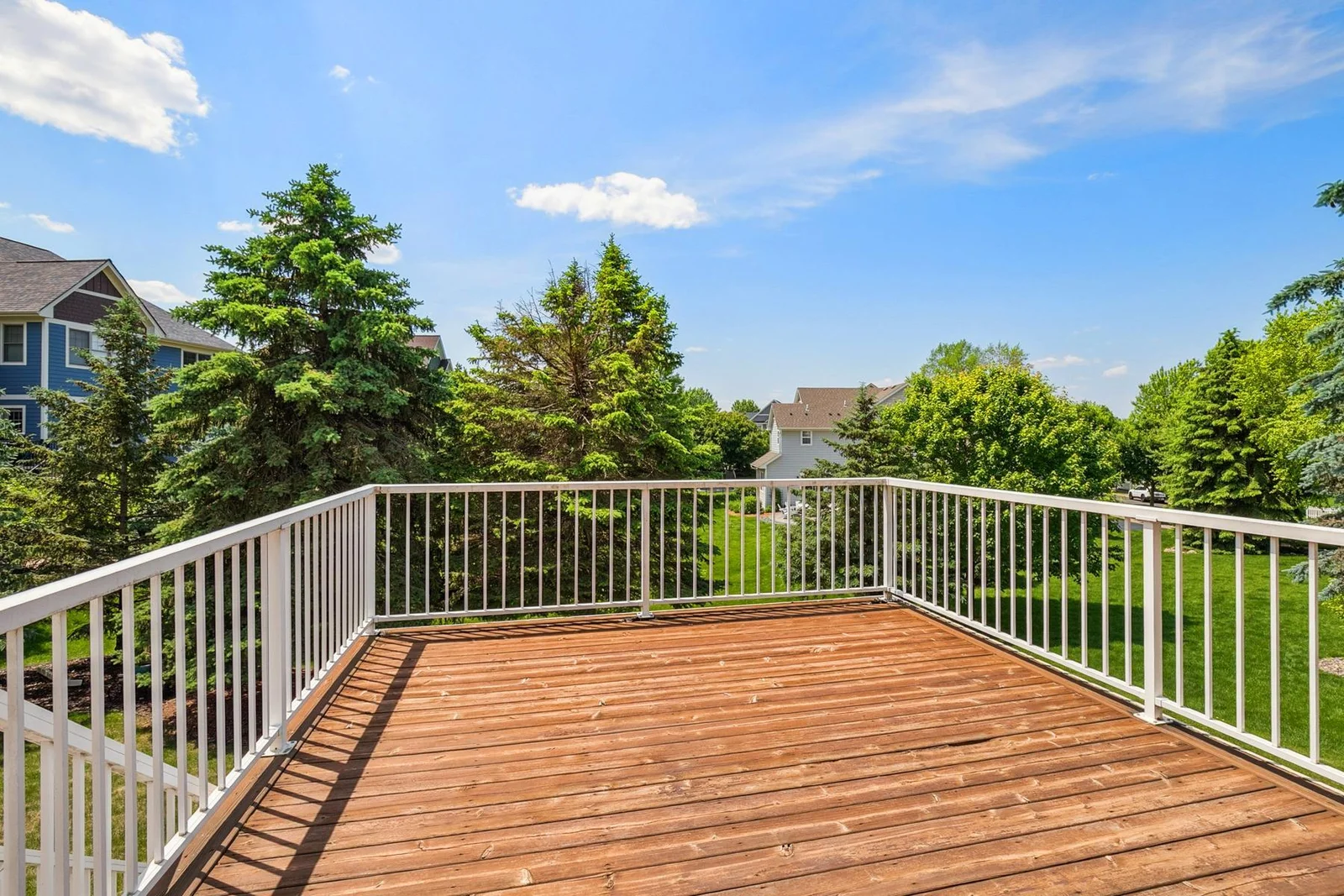 Step out from the kitchen onto your private deck—perfect for morning coffee or summer BBQs.
