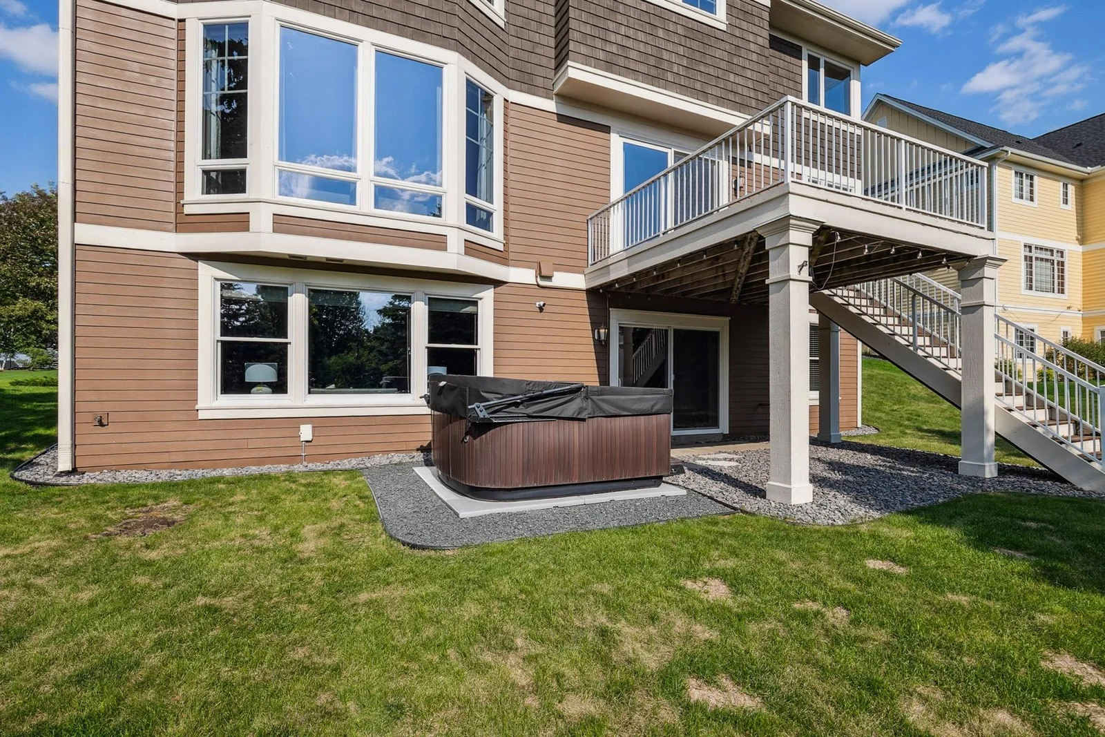 Step outside to your own hot tub oasis—ideal for unwinding after a long day.