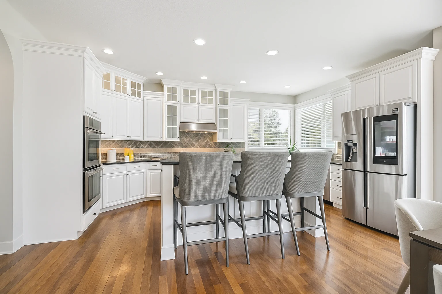 Custom solid wood cabinets with open concept eat in cafe and deck off the back - Virtually painted kitchen