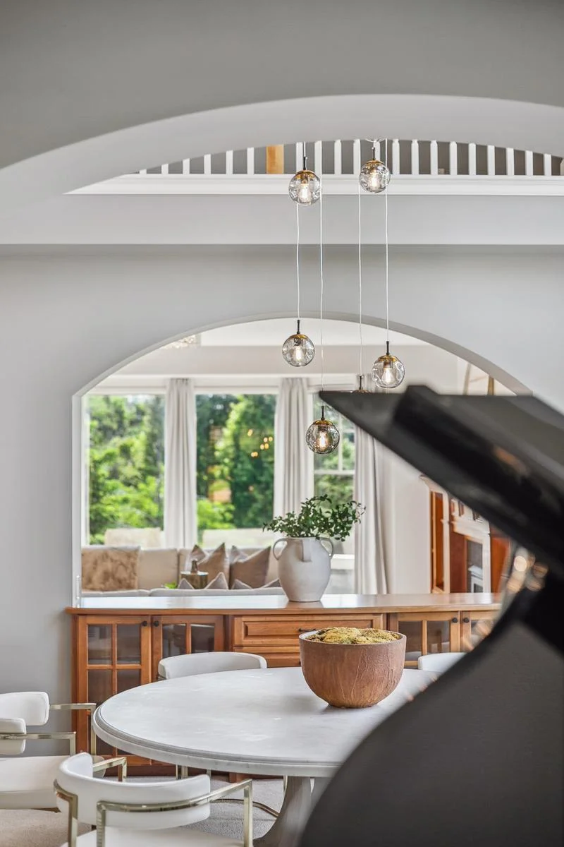 A graceful transition space where music, light, and conversation come together.