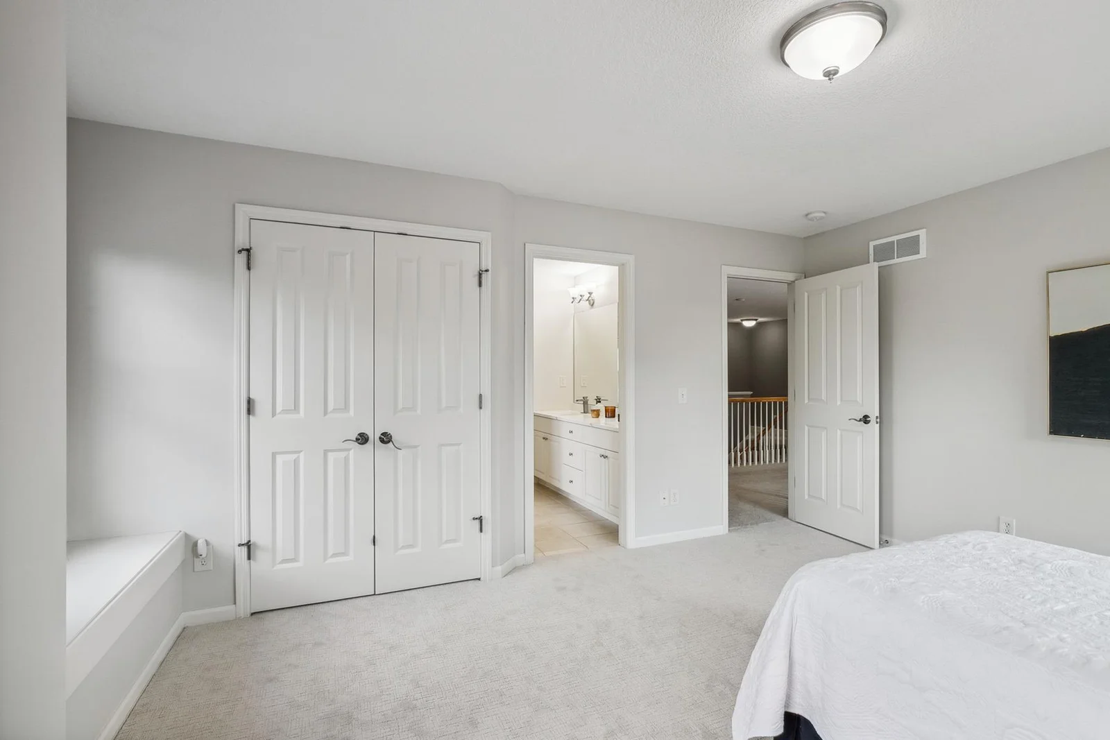 Bright and airy bedrooms connected by a well-appointed Jack and Jill bathroom.