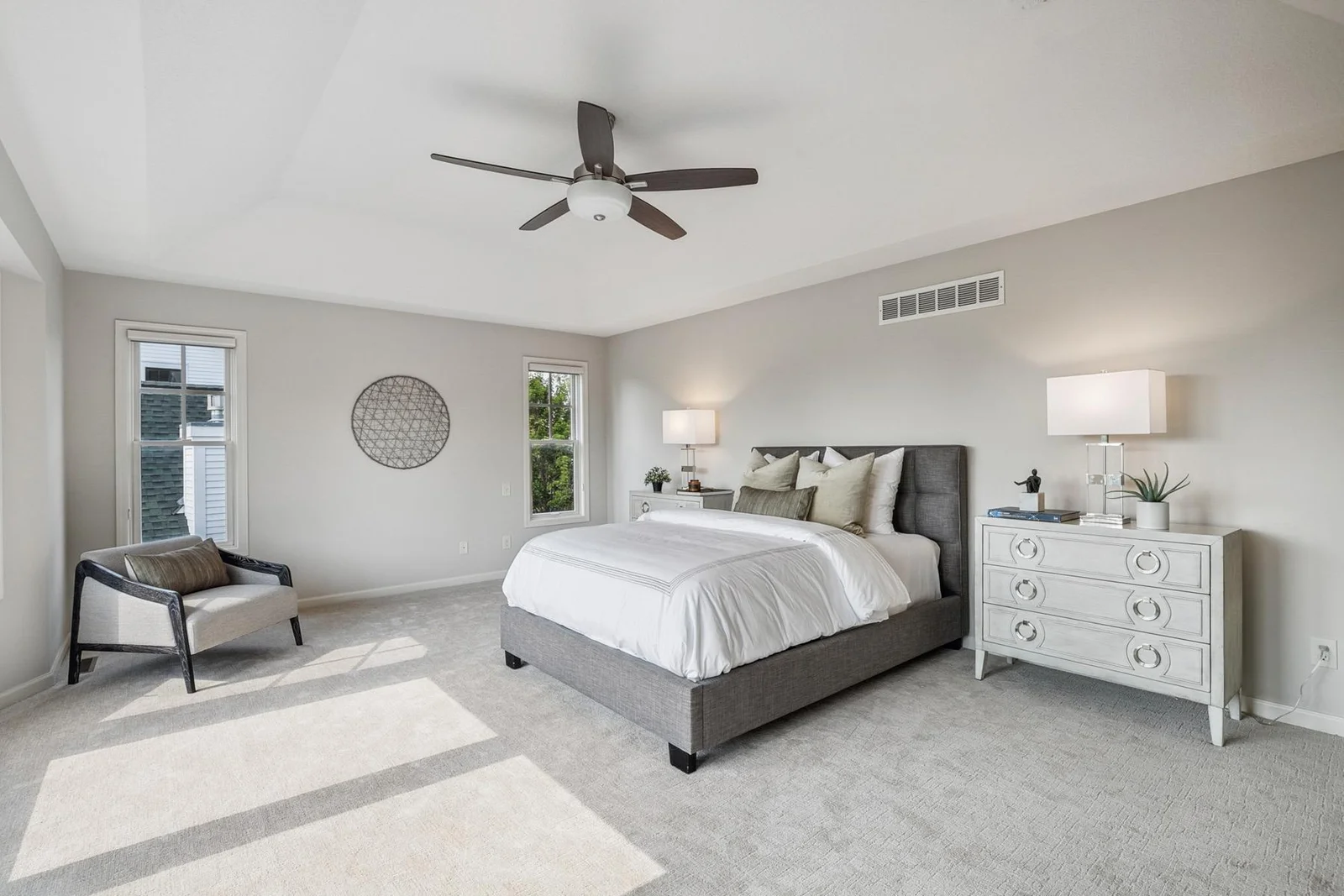 Oversized bedroom offering ample space for a sitting area or cozy reading nook.