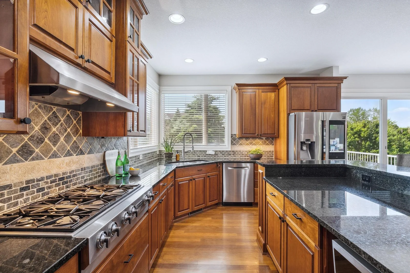 Open layout invites family and friends to gather while meals are prepared.