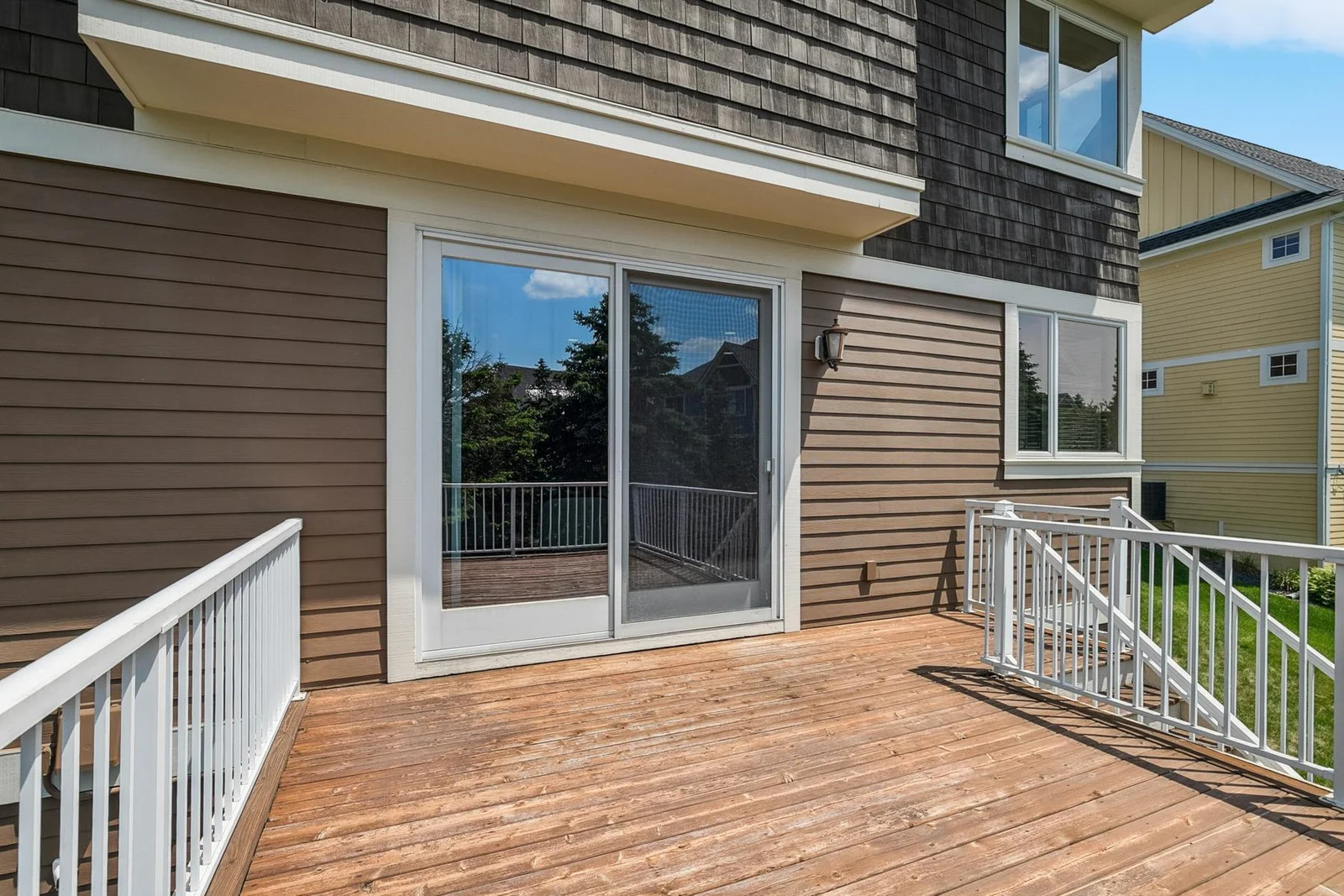 Enjoy seamless indoor-outdoor living with a spacious deck just steps from the heart of the home.